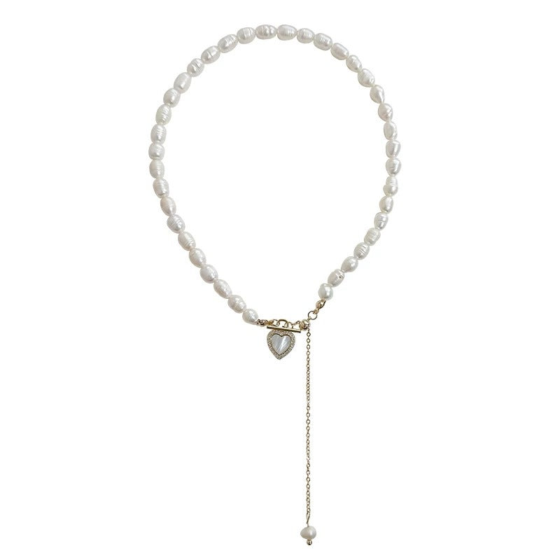 Damen Halskette mit elegantem Perlenanhänger und charmanten Herzdetails Shop Nory