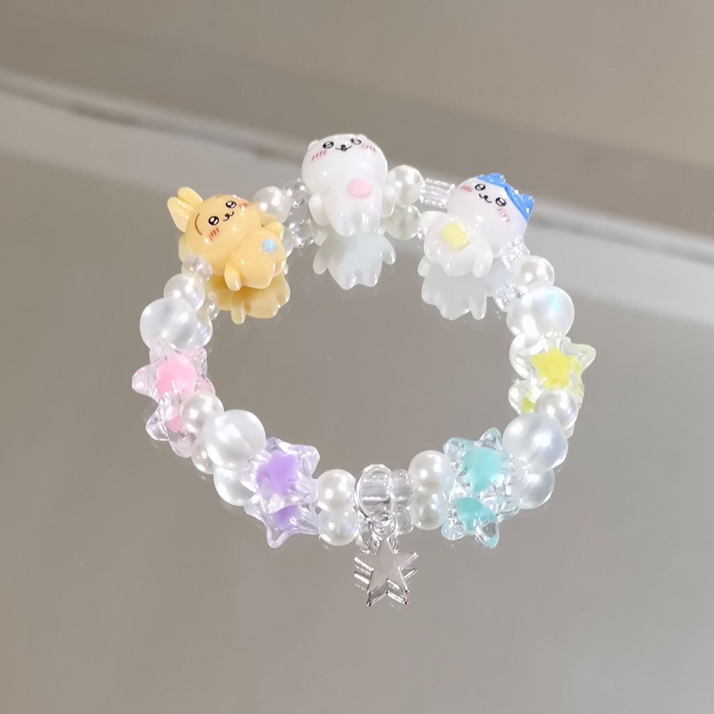 Damen Armband mit verspielten Tiermotiven und bunten Perlen Shop Nory