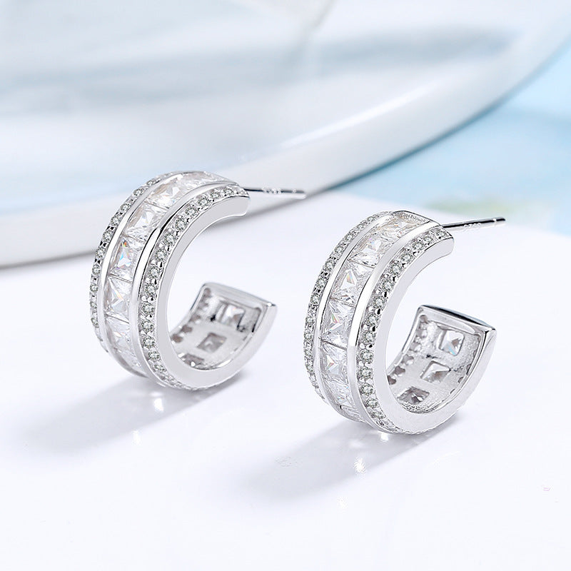 Damen Creolen mit funkelndem Zirkonbesatz und elegantem Design Shop Nory