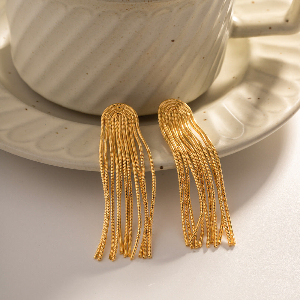 Damen Halskette mit goldenem Anhänger und auffälligen Fransen Shop Nory