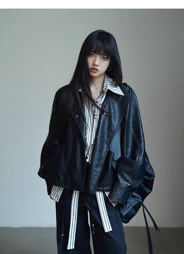 Damen Oversized Bikerjacke aus Kunstleder mit breitem Revers und voluminösen Ärmeln Shop Nory