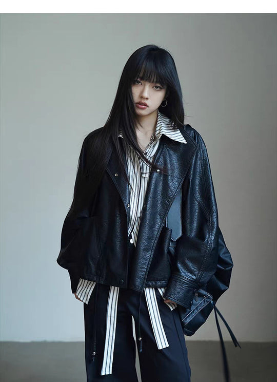 Damen Oversized Bikerjacke aus Kunstleder mit breitem Revers und voluminösen Ärmeln Shop Nory
