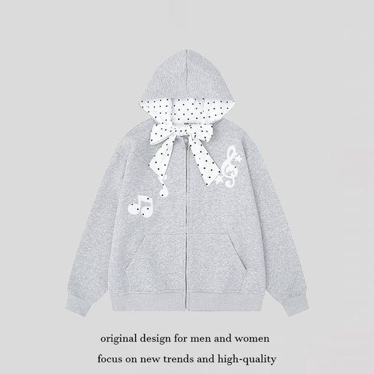 Damen Kapuzensweatjacke mit gepünktetem Kapuzenfutter, dekorativer Schleife und Notenmotiv Shop Nory