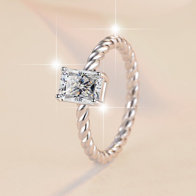 Damenring mit elegantem quadratischem Zirkonia und drehbarem Design Shop Nory