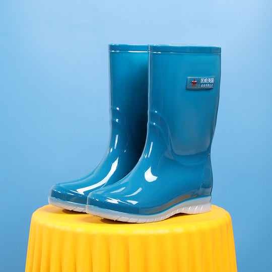 Damen Mittelhohe wasserdichte Gummistiefelette mit glänzender PVC‑Optik und rutschfester Sohle Shop Nory