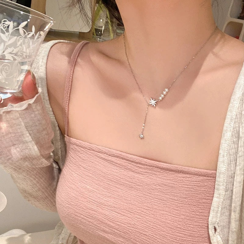Damen funkelnde Handkette mit Perlen und Sternen Anhänger Shop Nory
