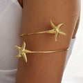 Damen goldfarbener Armreif mit maritimen Sternenmotiv Shop Nory