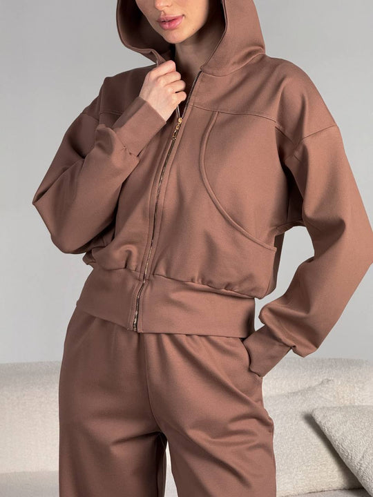 Damen kurz geschnittene Reißverschluss-Kapuzenjacke mit überschnittener Schulter, tiefen Eingrifftaschen und elastischem Bund Shop Nory