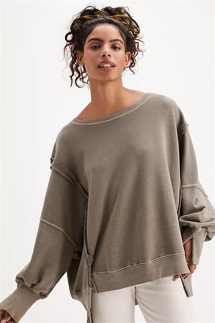 Damen oversized Sweatshirt mit Ballonärmeln, offenen Saumnähten und seitlichen Schlitzen Shop Nory