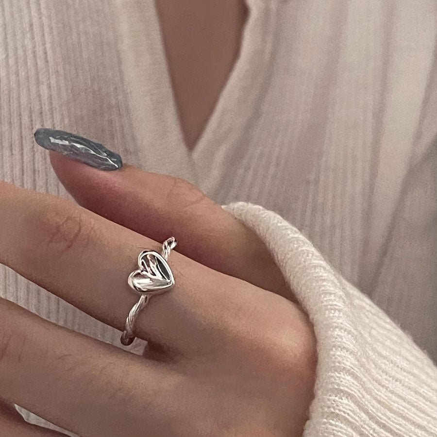 Damen herzförmiger Silberring mit elegantem Drehdesign Shop Nory