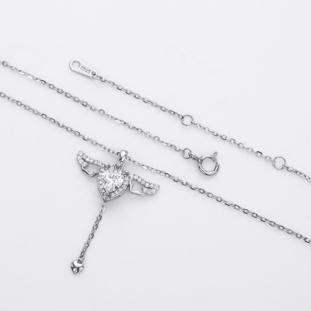 Damen Halskette mit herzförmigem Anhänger und Engelsflügeln Shop Nory