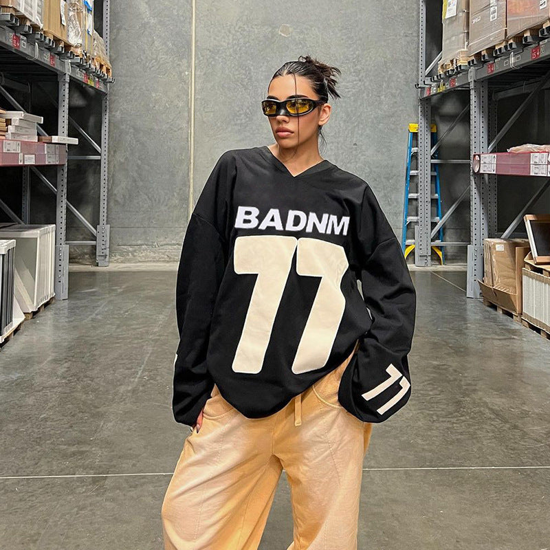 Damen Oversize Sport-Sweatshirt mit V-Ausschnitt und Statement-Print Shop Nory