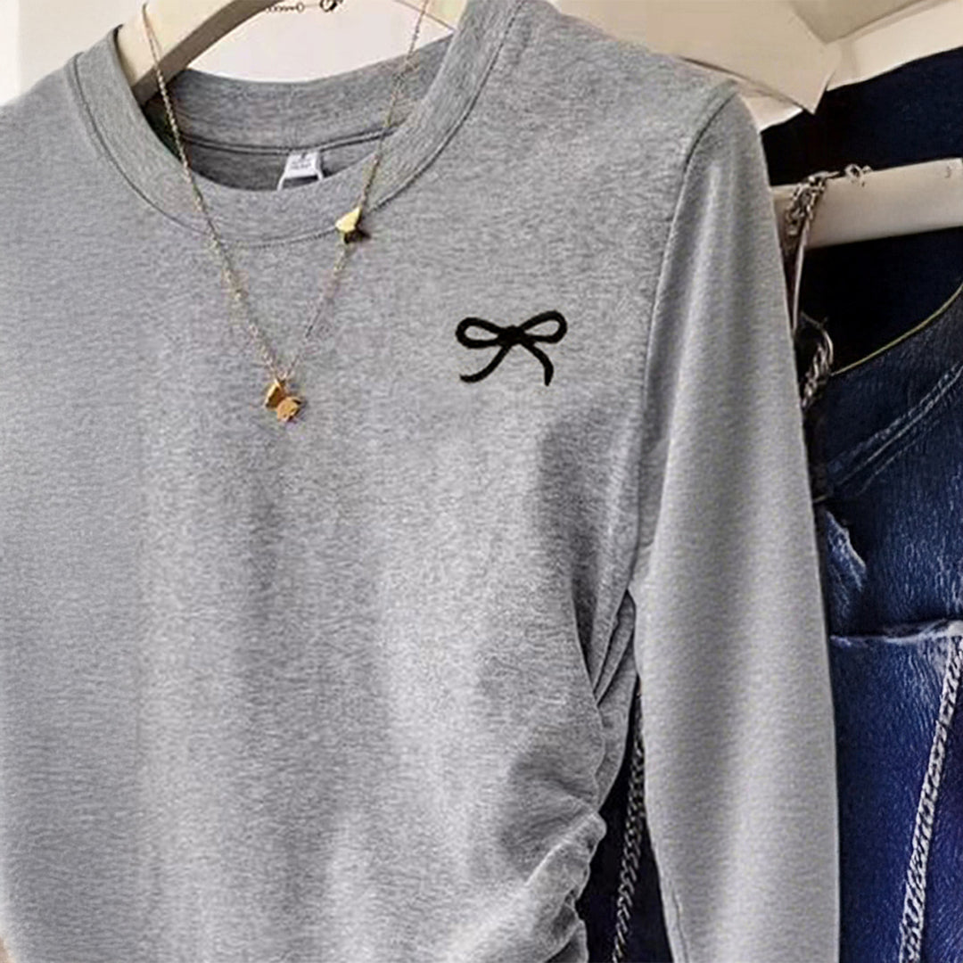 Damen nan gerüschtes Langarmshirt mit dezenter Schleifen-Stickerei und taillierter Drapierung Shop Nory