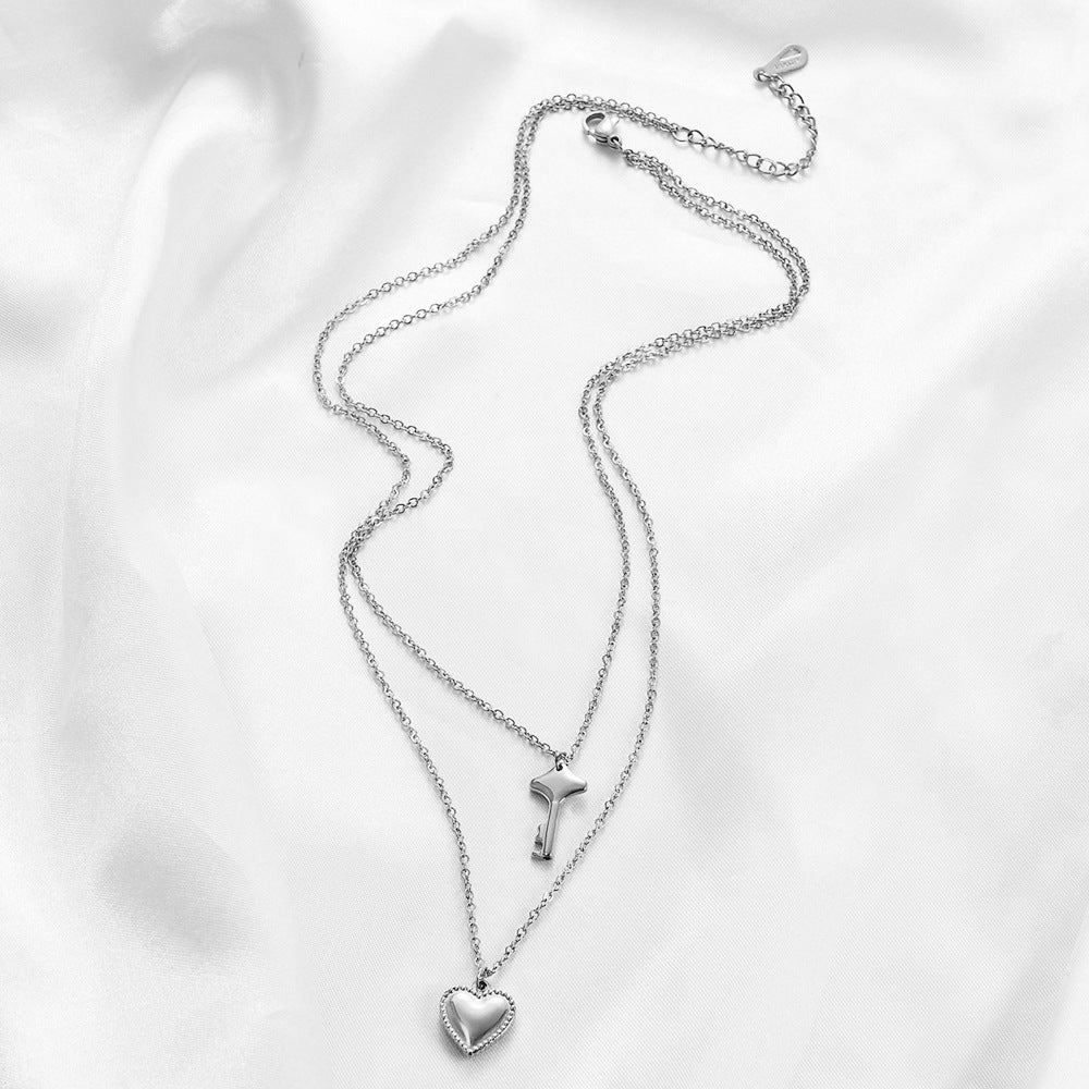Damen Halskette mit Herz- und Schlüsselanhänger Shop Nory