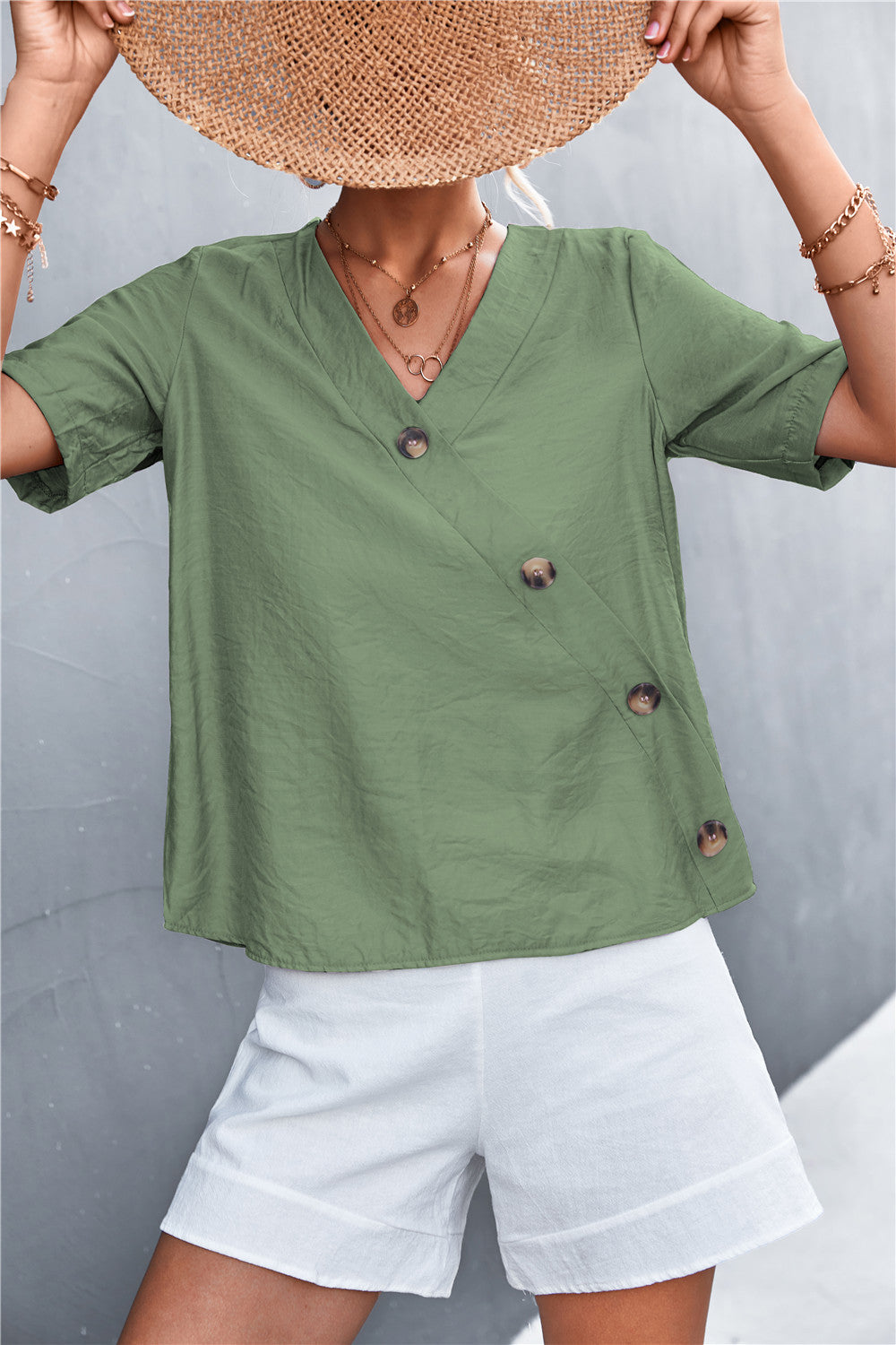 Damen lässige Bluse mit Wickeloptik und Knopfdetails