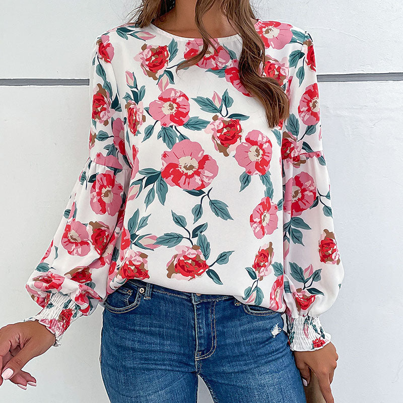 Damen Leichte Bluse mit großflächigem Blumenprint, Volumenärmeln und Smokbündchen Shop Nory