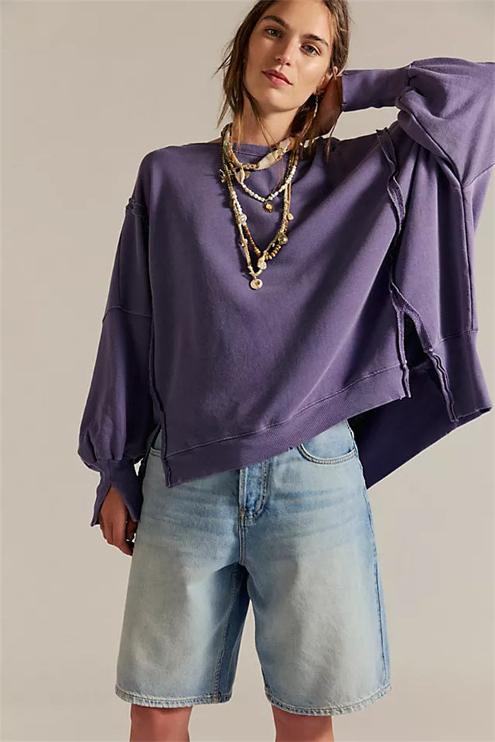 Damen oversized Sweatshirt mit Ballonärmeln, offenen Saumnähten und seitlichen Schlitzen Shop Nory