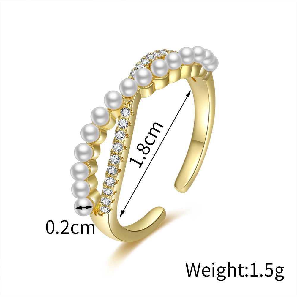 Damen eleganter Perlenarmreif mit funkelnden Zirkonias Shop Nory
