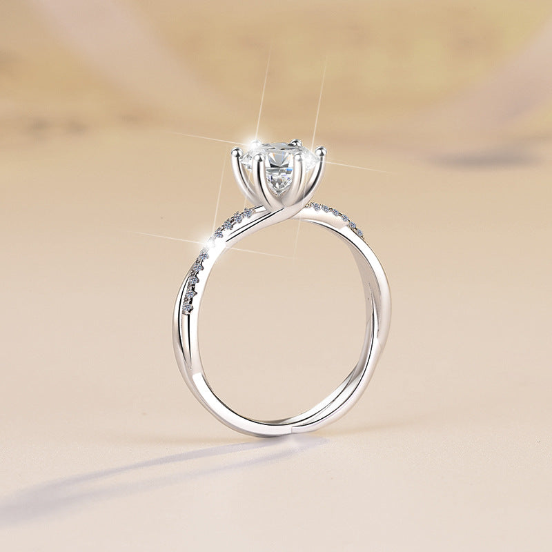 Damen Verlobungsring mit funkelndem Hauptstein und eleganter Zirkonia-Besatz Shop Nory