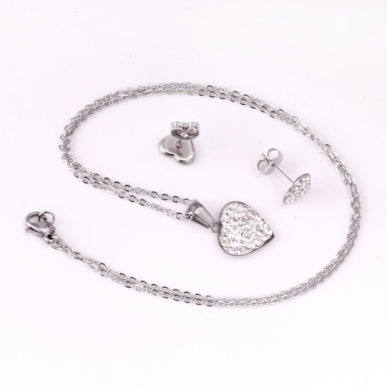 Damen Schmuckset mit funkelnden Herzanhängern und eleganten Ohrsteckern Shop Nory
