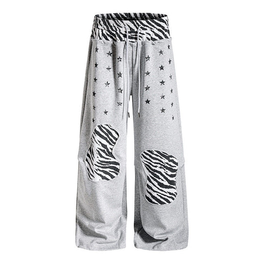 Damen Lässige Palazzo-Jogginghose mit Elastbund, Zebra‑Kniepatches und Sternen‑Print Shop Nory