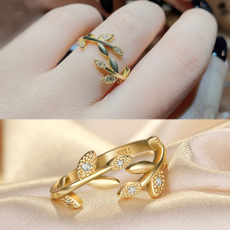 Damenring mit kunstvollem Blattdesign aus hochwertigem 925er Silber und funkelnden Zirkonia Shop Nory