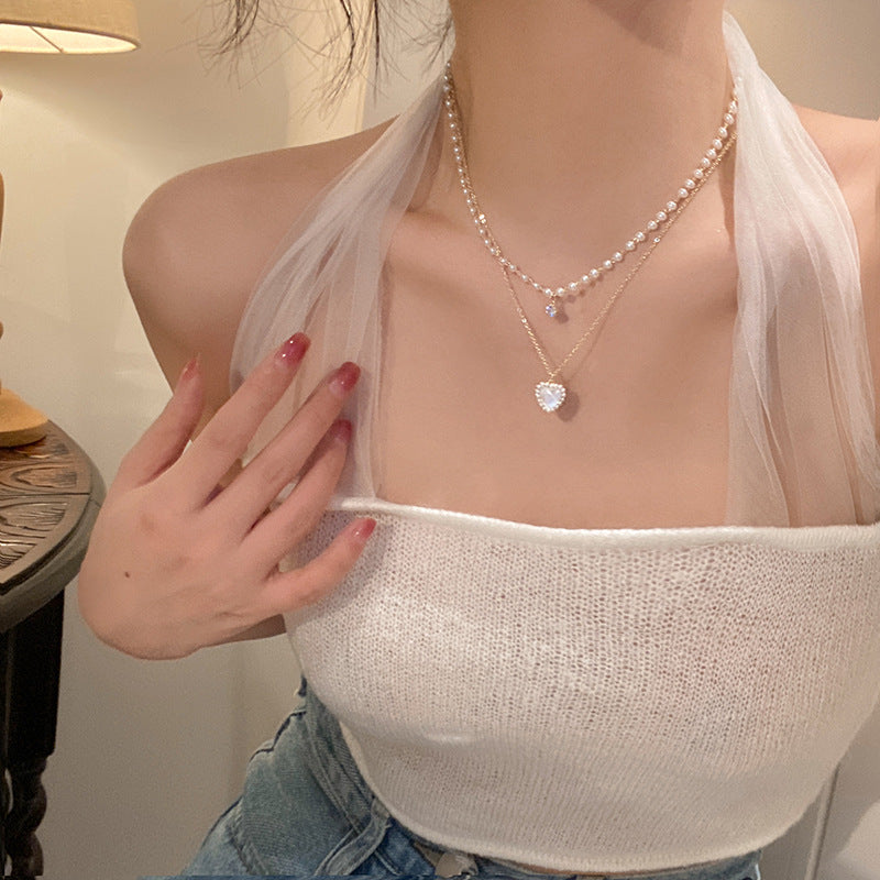Damen Halskette mit filigranem Schmetterlingsdesign und funkelnden Perlen Shop Nory