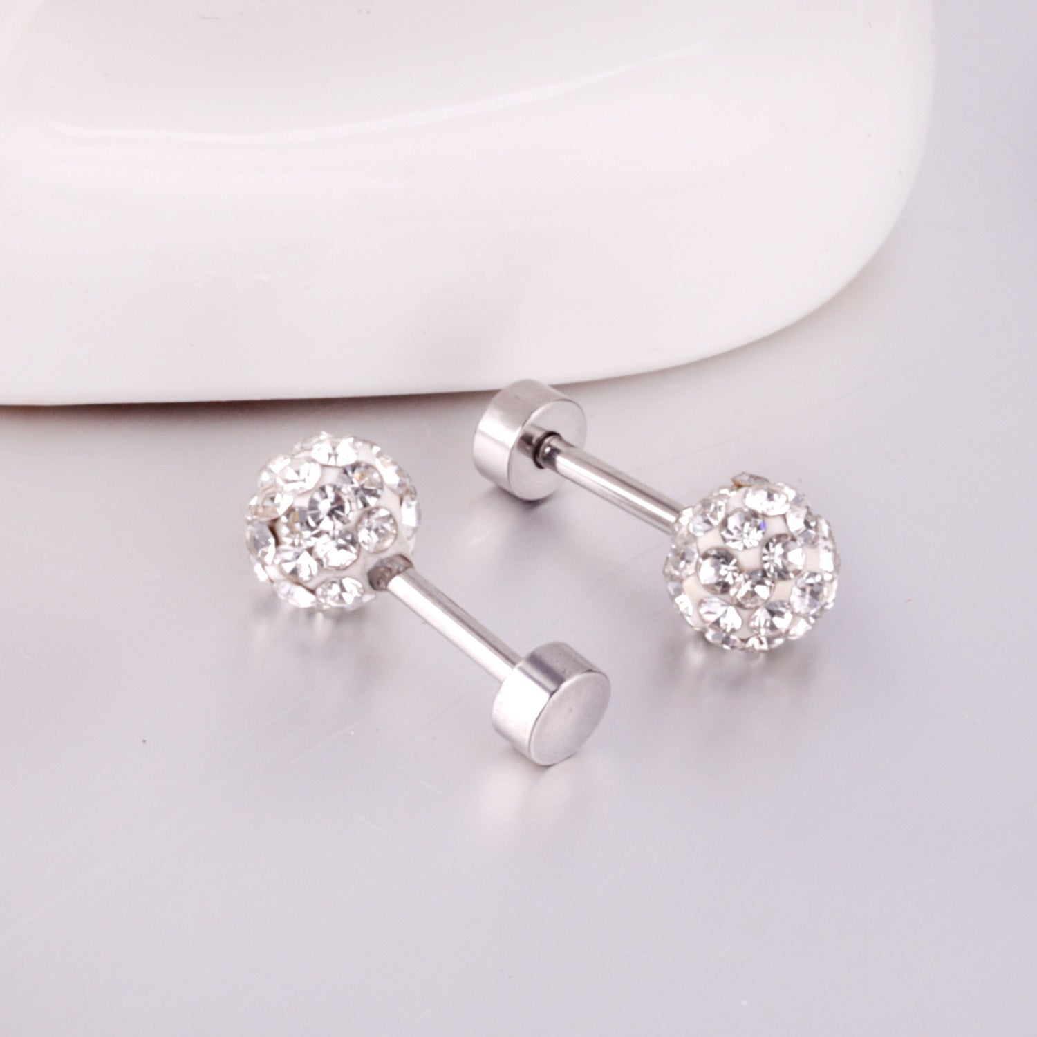 Damen Ohrstecker aus Edelstahl mit funkelnden Zirkonia Shop Nory