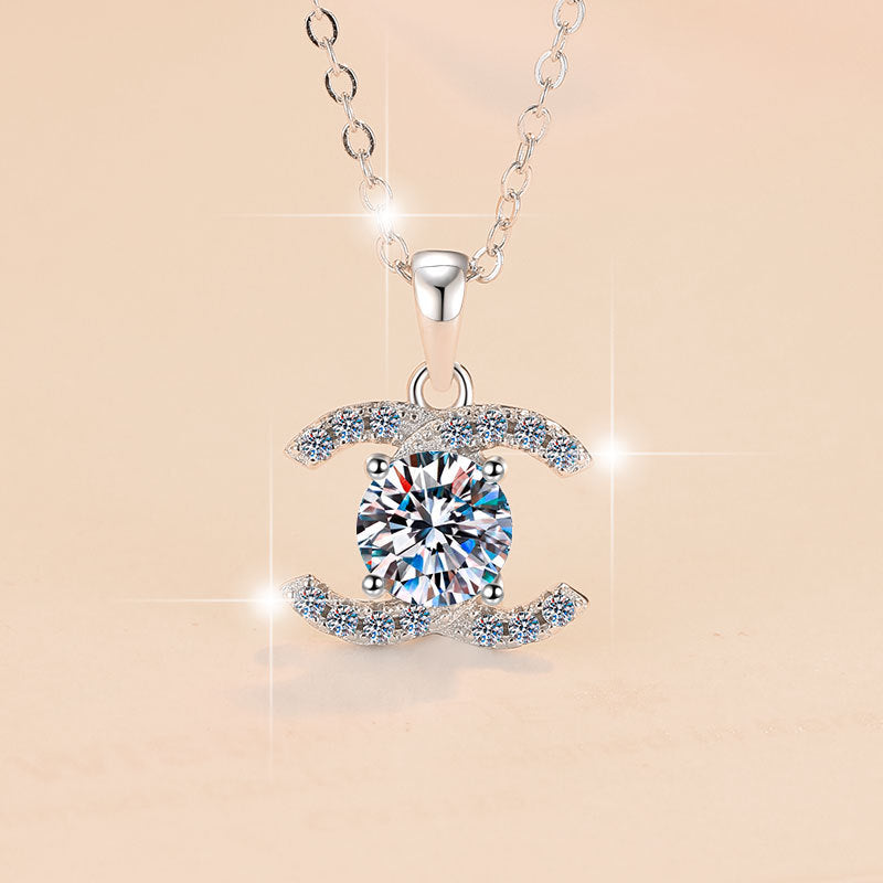 Damen Halskette mit funkelndem Kristall-Anhänger und eleganter Designfassung Shop Nory