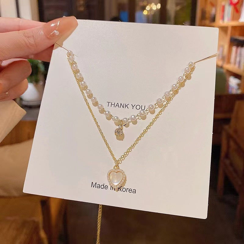 Damen Halskette mit mehrlagigem Perlen- und Anhänger-Design Shop Nory