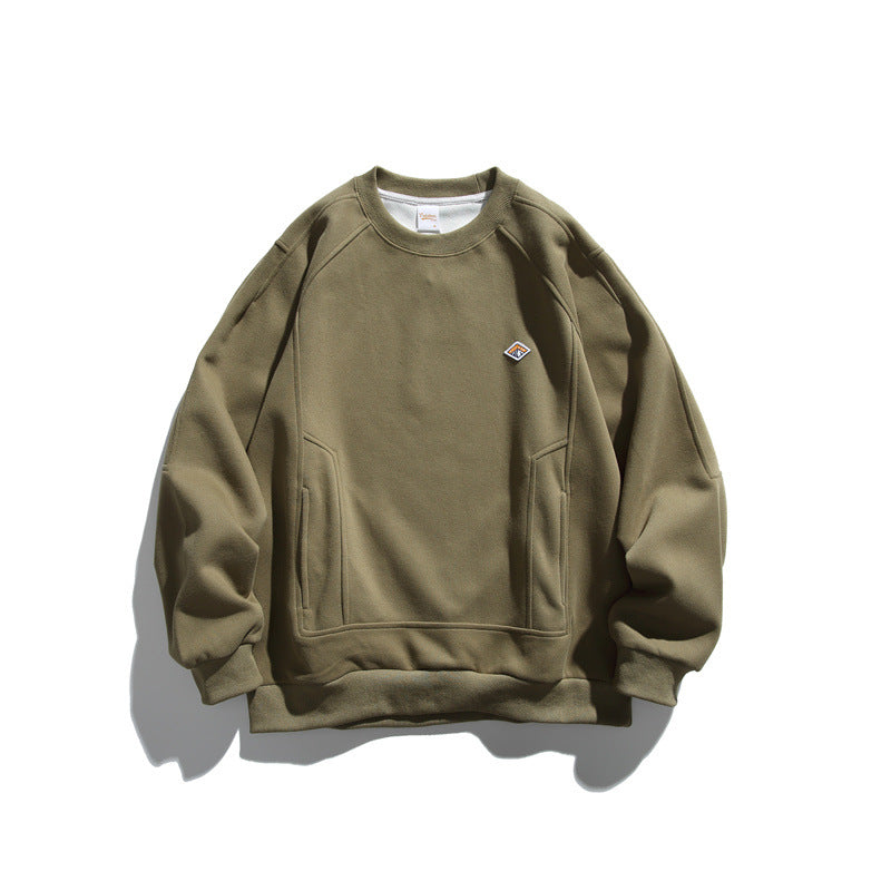 Unisex Oversize-Sweatshirt aus French-Terry mit Raglanärmeln, verdeckten Eingrifftaschen und kleinem Logopatch Shop Nory