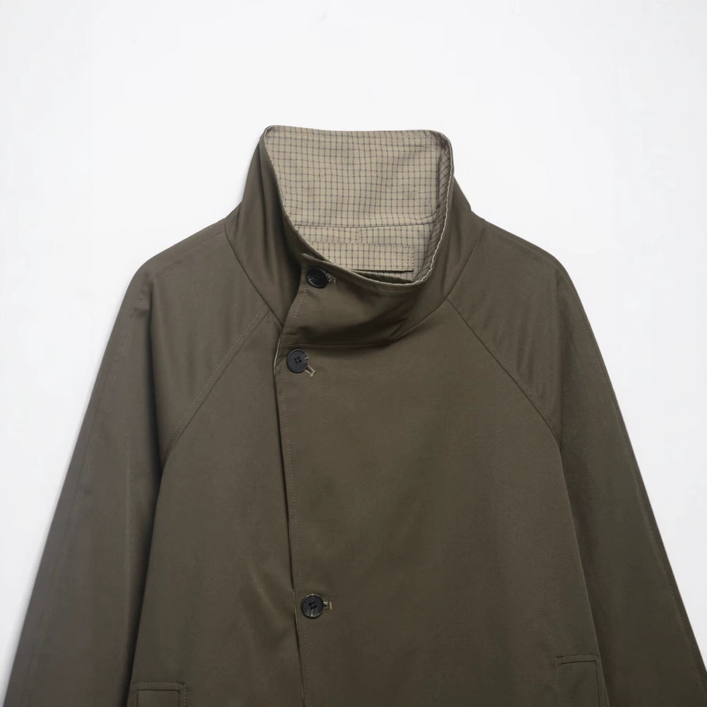 Damen kurzes Cape‑Mantel mit hohem Stehkragen, verdeckter Knopfleiste und Eingrifftaschen Shop Nory