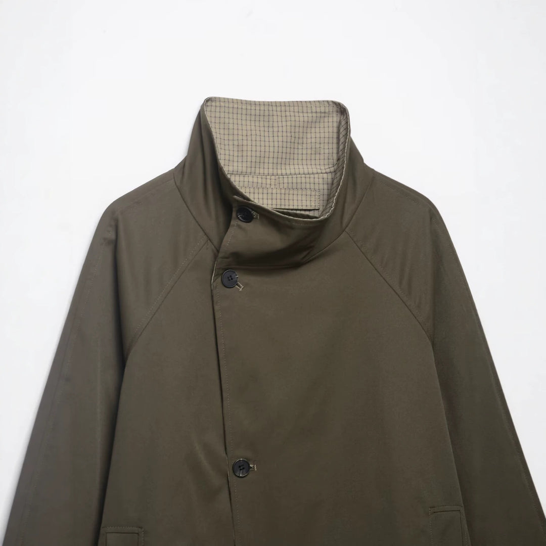 Damen kurzes Cape‑Mantel mit hohem Stehkragen, verdeckter Knopfleiste und Eingrifftaschen Shop Nory