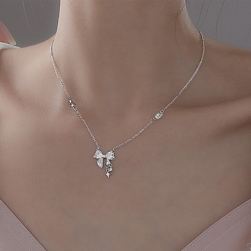 Damen zarte Halskette mit kristallinem Schleifenanhänger Shop Nory