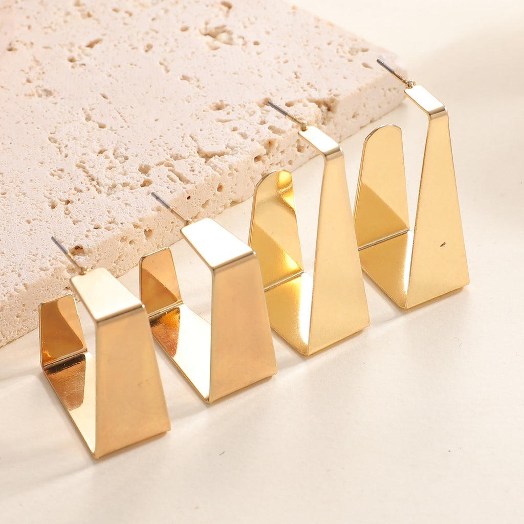 Damen Ohrringe mit modernem skulpturalem Design Shop Nory