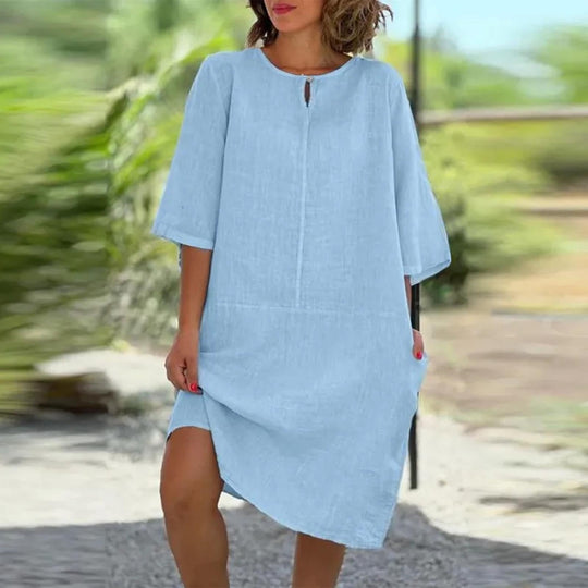 Damen luftig geschnittenes Kleid mit praktischen Taschen und elegantem Ausschnitt