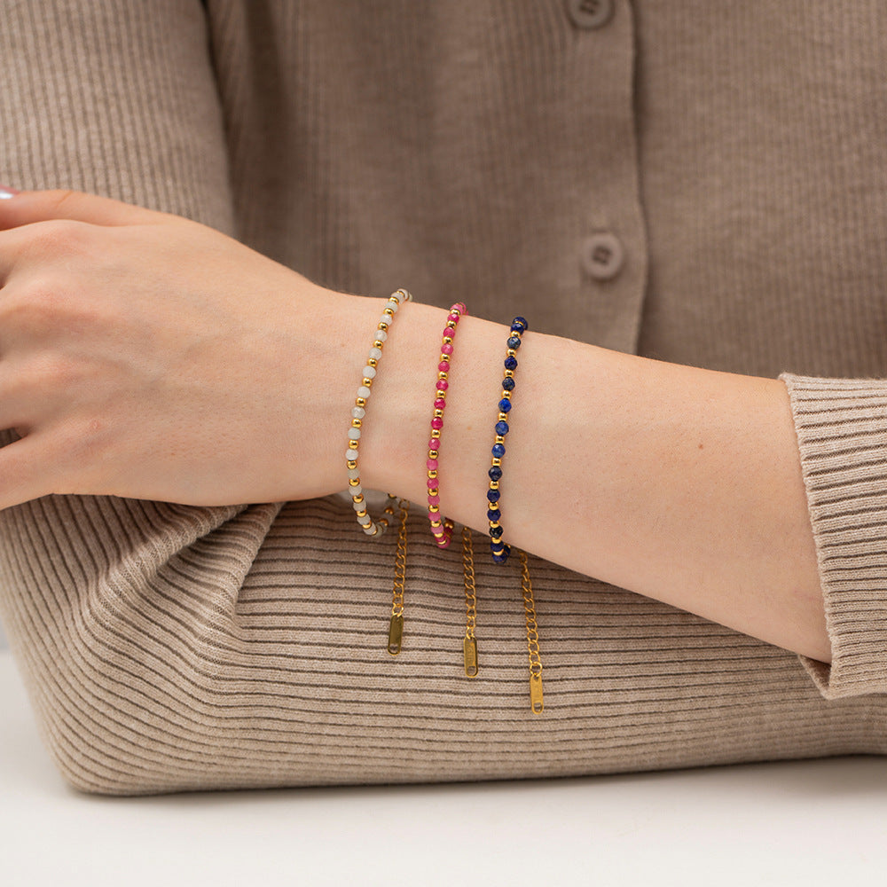 Damen Armband mit funkelnden Kristallen und goldenem Gliederdesign Shop Nory