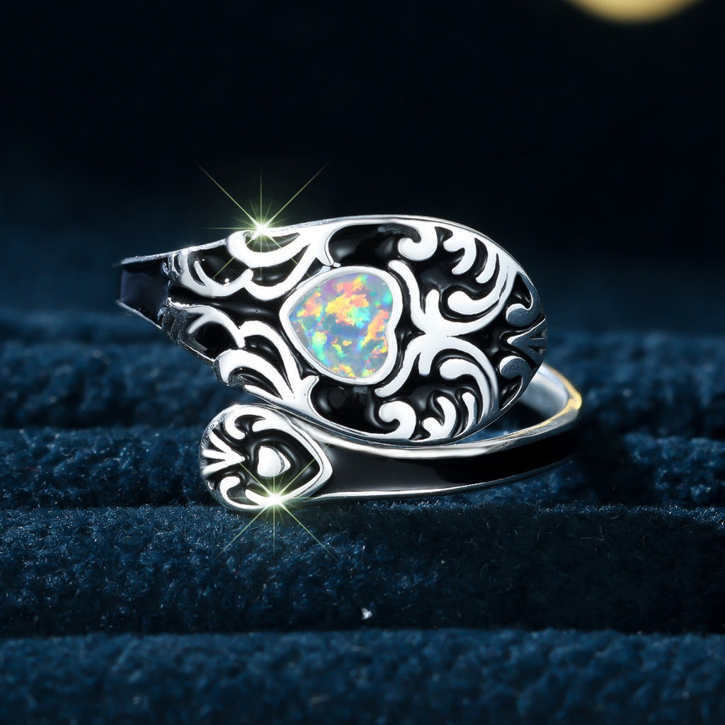 Damen Ring mit kunstvollem Design und schimmerndem Opal Shop Nory