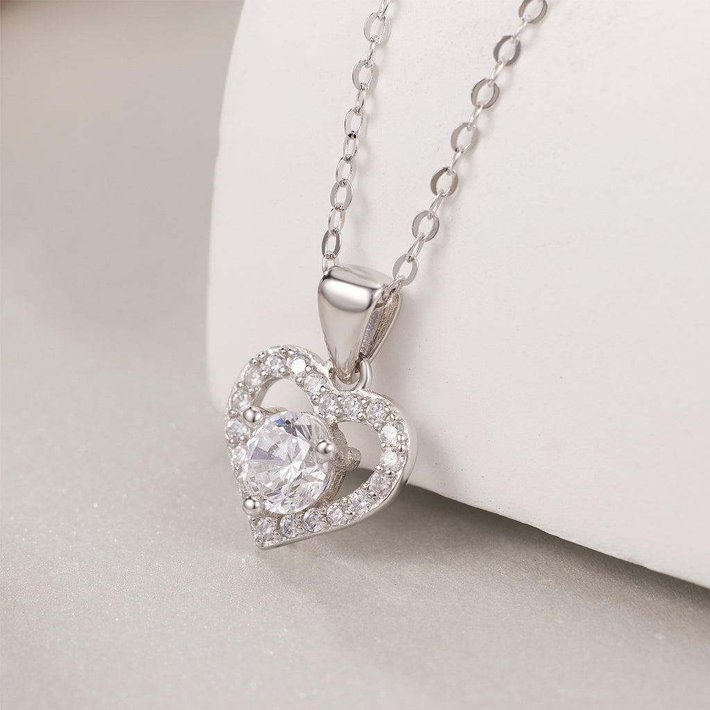 Damen Halskette mit herzförmigem Anhänger und funkelnden Zirkoniasteinen Shop Nory