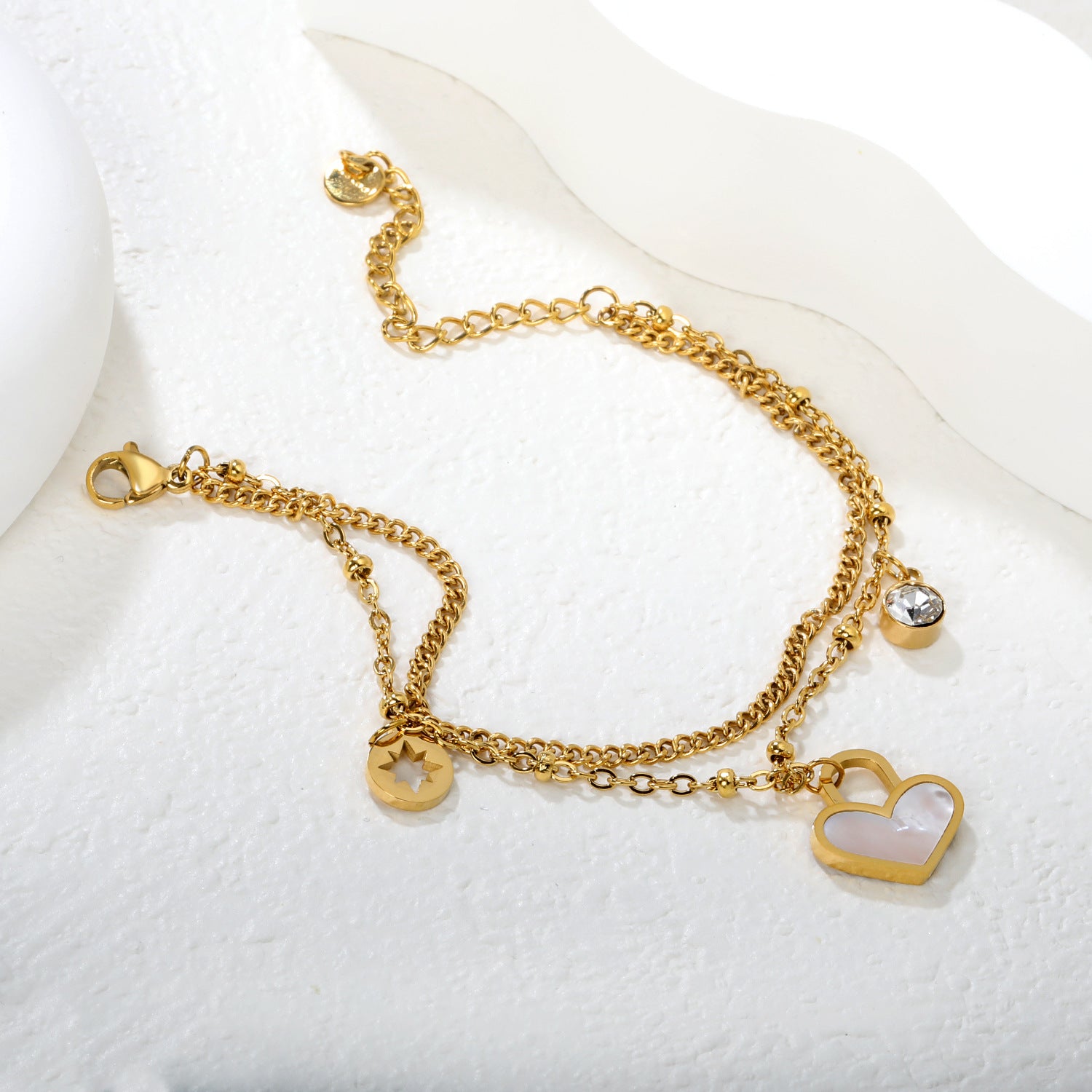 Damen Armband mit Herzen-Anhänger und funkelnden Kristallen Shop Nory