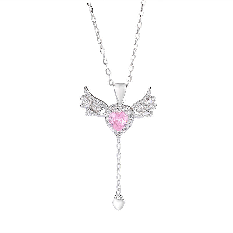 Damen Halskette mit herzförmigem Anhänger und engelgleichen Flügeln Shop Nory