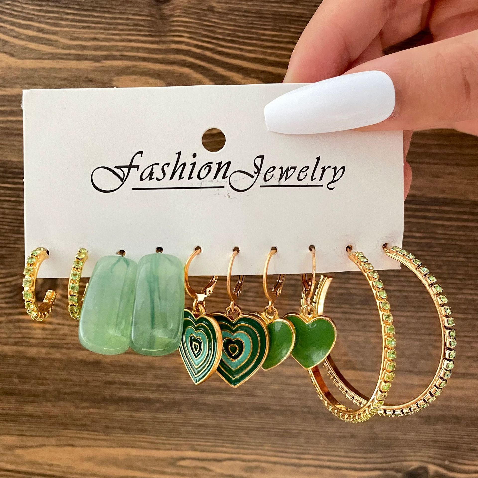 Damen Ohrringe Set mit eleganten herzförmigen Anhängern und funkelnden Kristallen Shop Nory