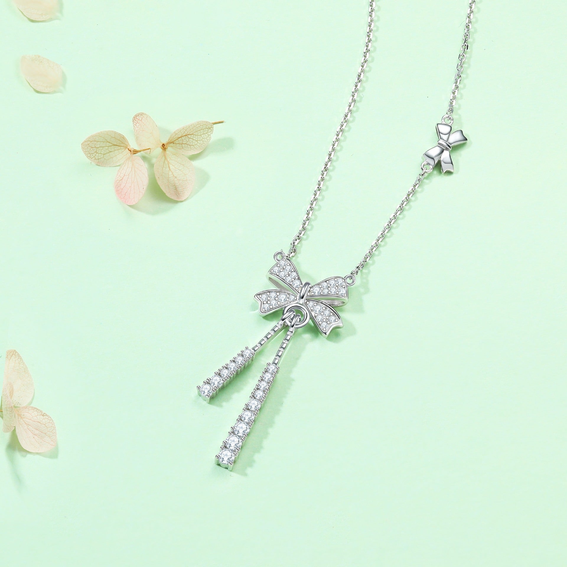 Damen Halskette mit kunstvollem Schleifenmotiv und funkelnden Zirkonia-Details Shop Nory
