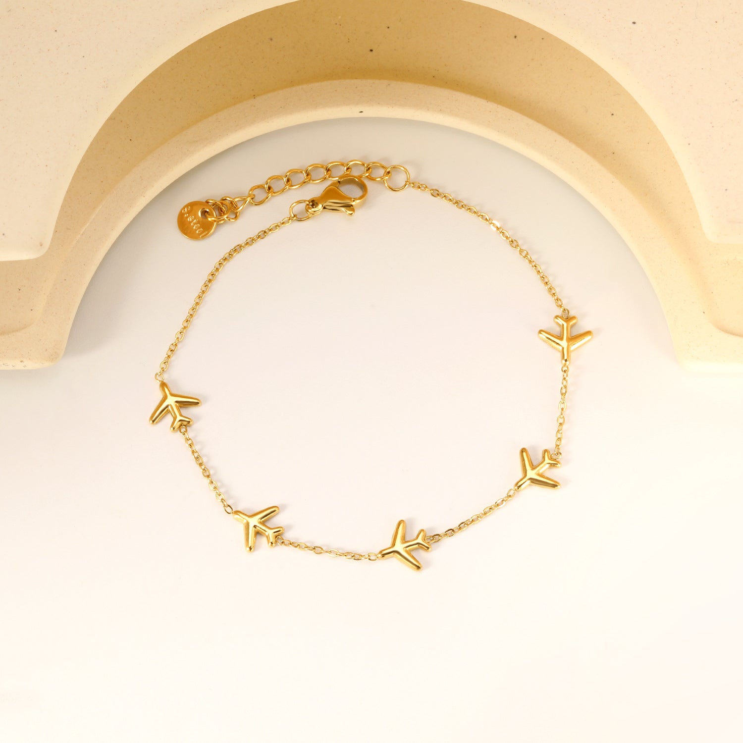 Damen Armband mit stilvollen Flugzeug-Anhängern aus antiallergischem Edelstahl Shop Nory