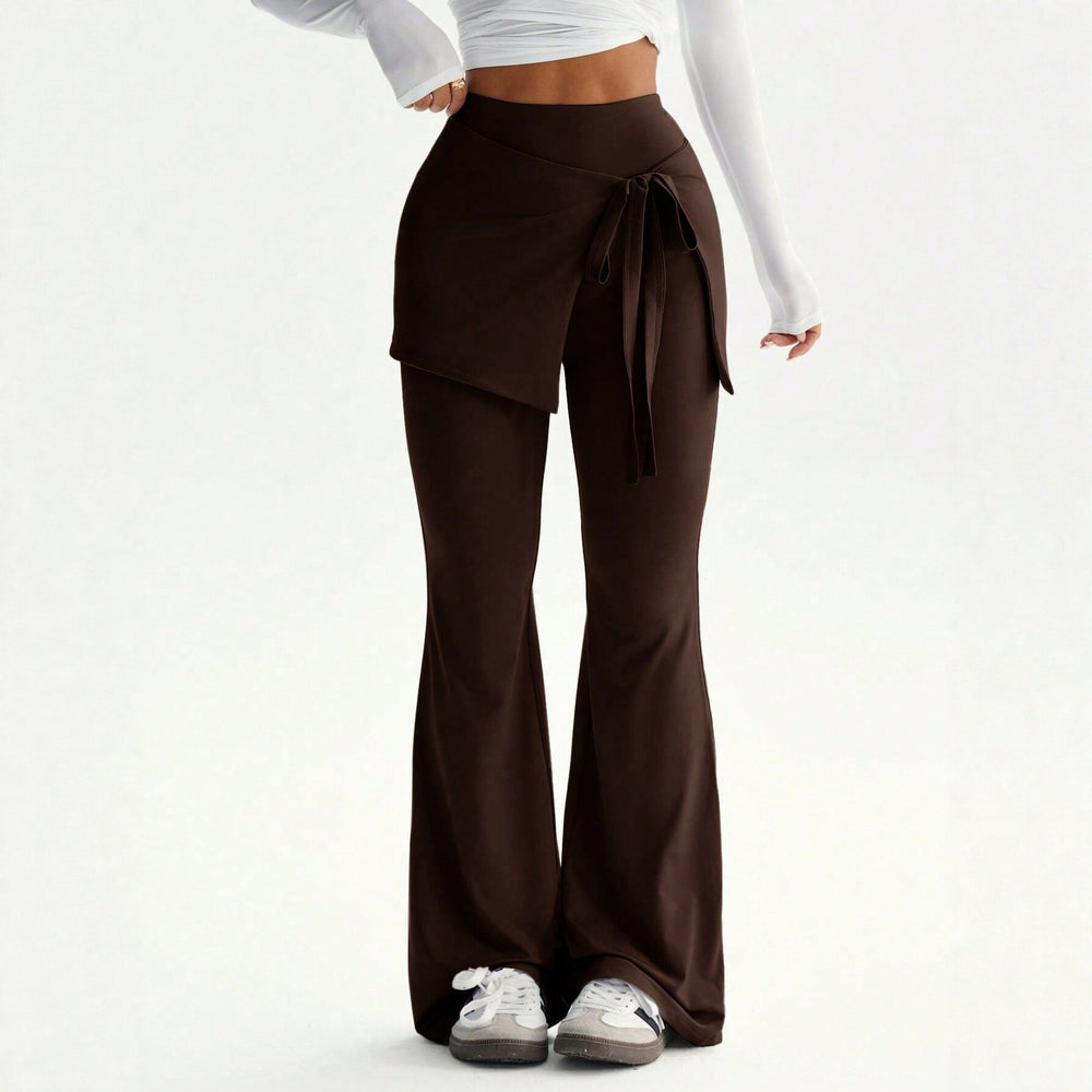 Damen hochtaillierte Schlaghose mit Wickelrock-Overlay und Taillenschleife Shop Nory