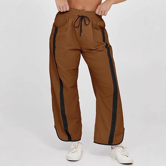 Damen nan relaxte Trackpants mit seitlichem Kontraststreifen, elastischem Smokbund und Eingrifftaschen Shop Nory