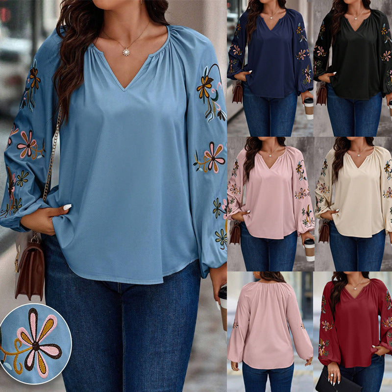Damen Locker sitzende V-Ausschnitt Bluse mit floraler Stickerei an Ballonärmeln Shop Nory
