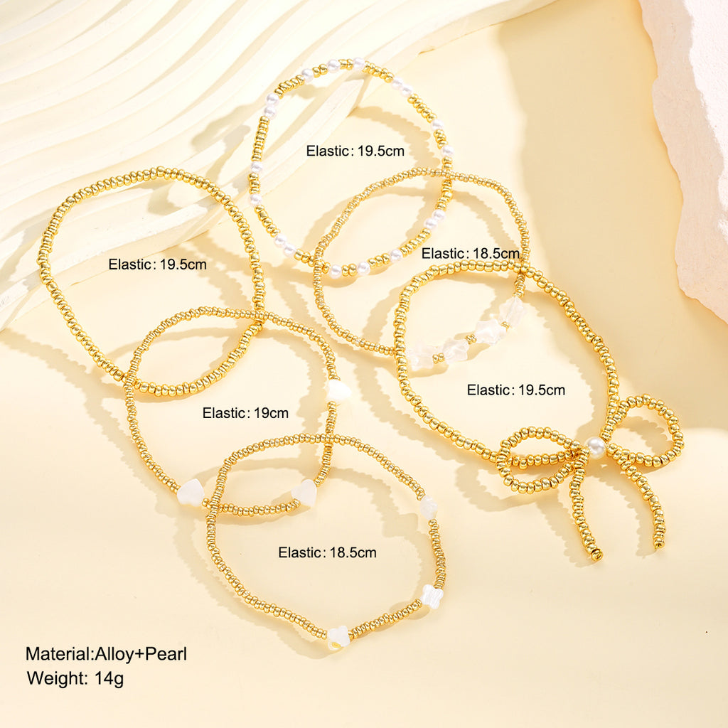 Damen Armreif-Set mit kreativen Perlen und zarten Sternenmotiven Shop Nory