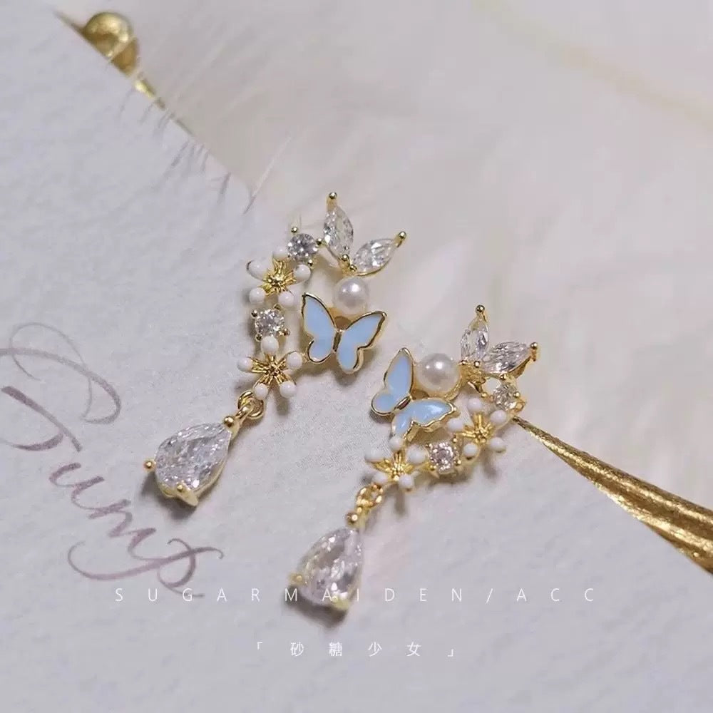 Damen Ohrstecker mit floralem Schmetterlingsdesign und funkelnden Akzenten Shop Nory