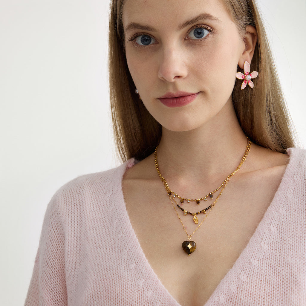 Damen Halskette mit funkelnden Zirkonia und Herzanhängern Shop Nory
